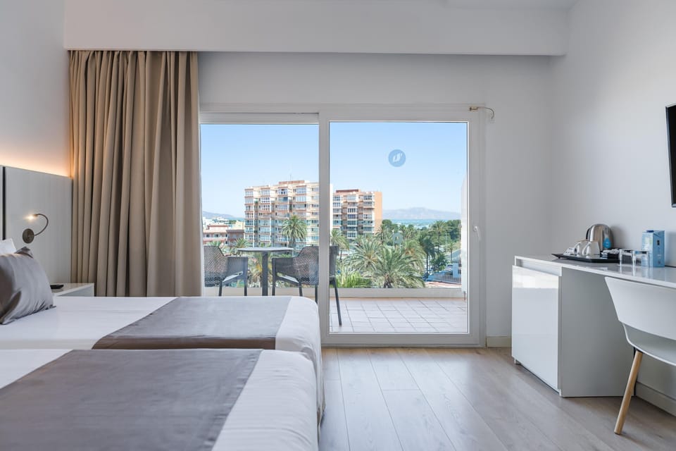 Superior Double Room, Balcony, Partial Sea View | Desk, WiFi (free), bed sheets