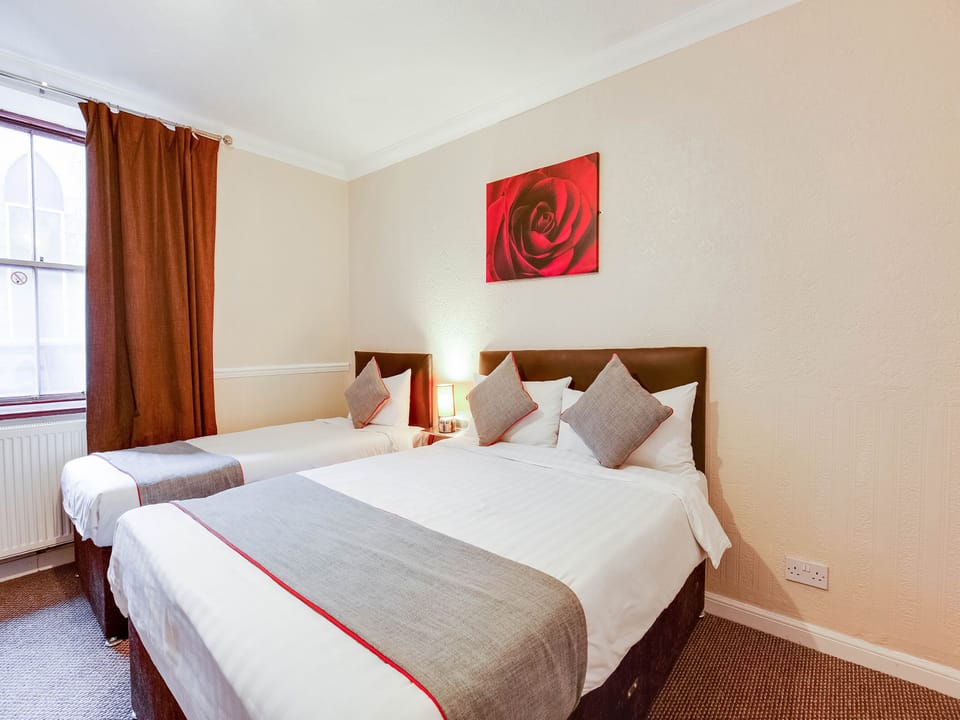 Triple Room, Multiple Beds | Desk, iron/ironing board, free cribs/infant beds, free WiFi