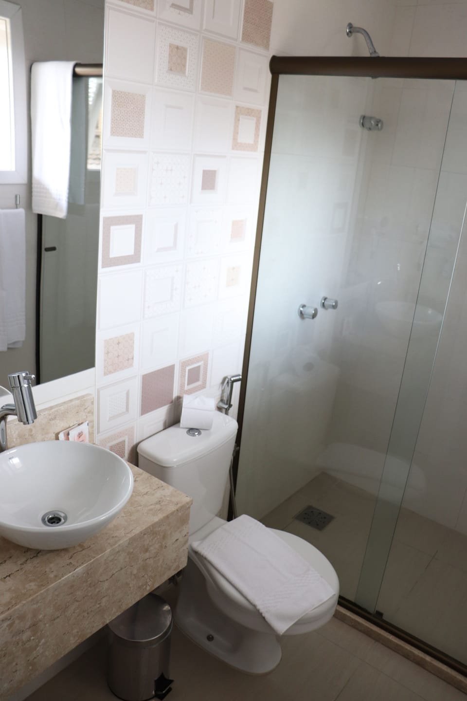 Shower, designer toiletries, hair dryer, bidet
