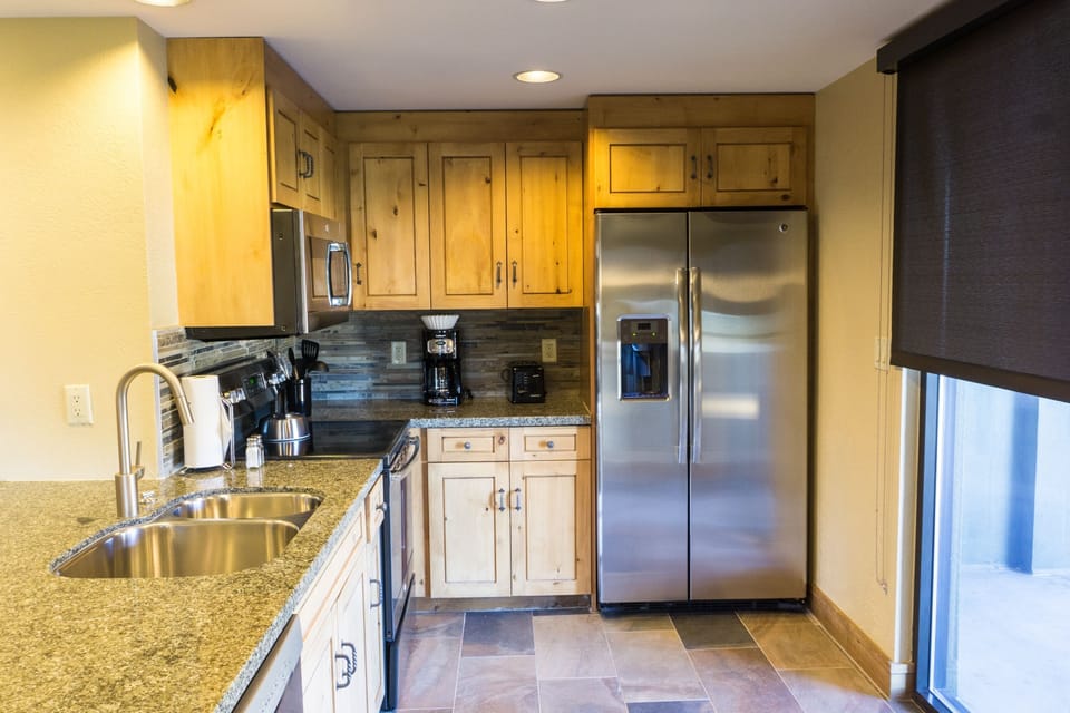 Condo, 1 Bedroom | Private kitchen | Full-size fridge, microwave, oven, stovetop