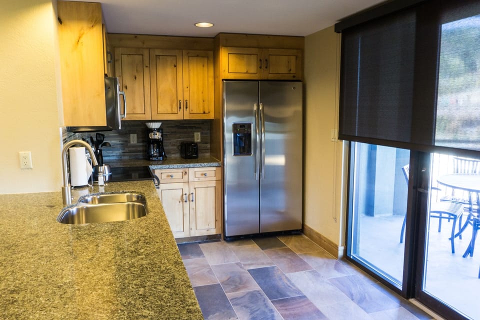 Condo, 1 Bedroom | Private kitchen | Full-size fridge, microwave, oven, stovetop