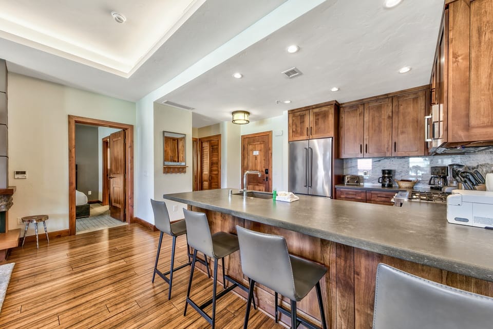 Condo, 2 Bedrooms | Private kitchen | Fridge, microwave, oven, dishwasher