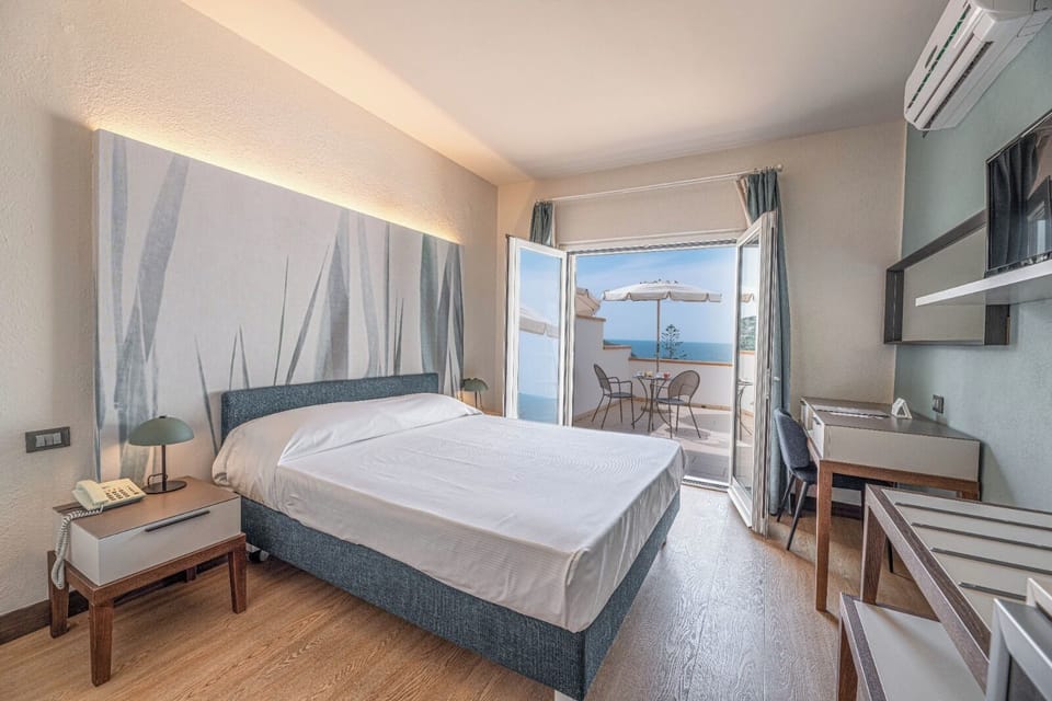 Panoramic Double or Twin Room, Sea View | Minibar, in-room safe, desk, free WiFi