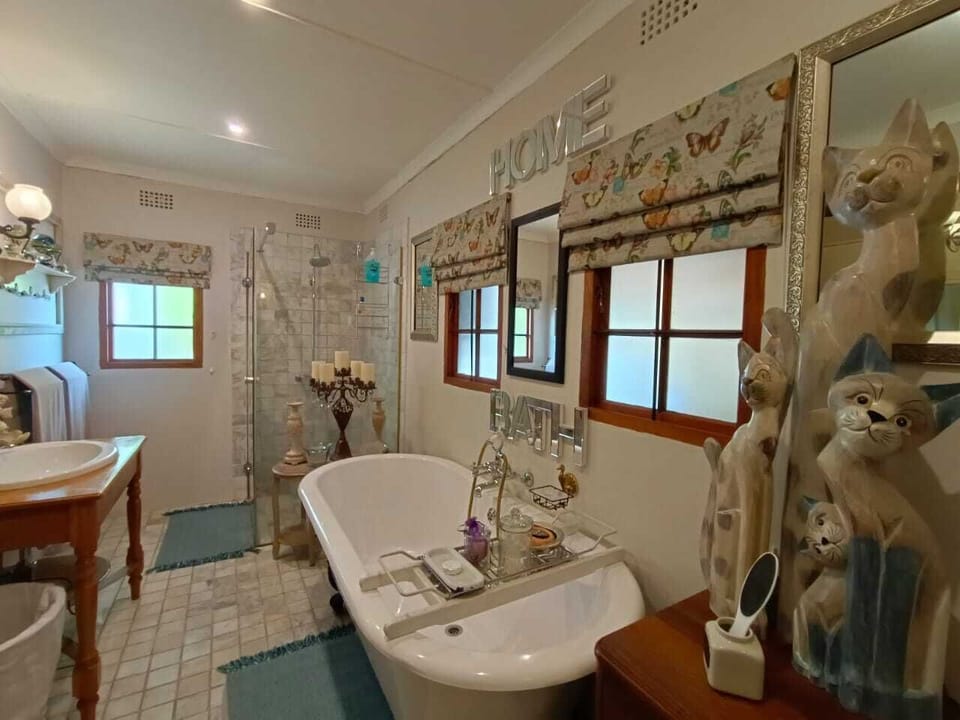 Luxury Suite, 1 Bedroom | Bathroom | Shower, rainfall showerhead, designer toiletries, hair dryer