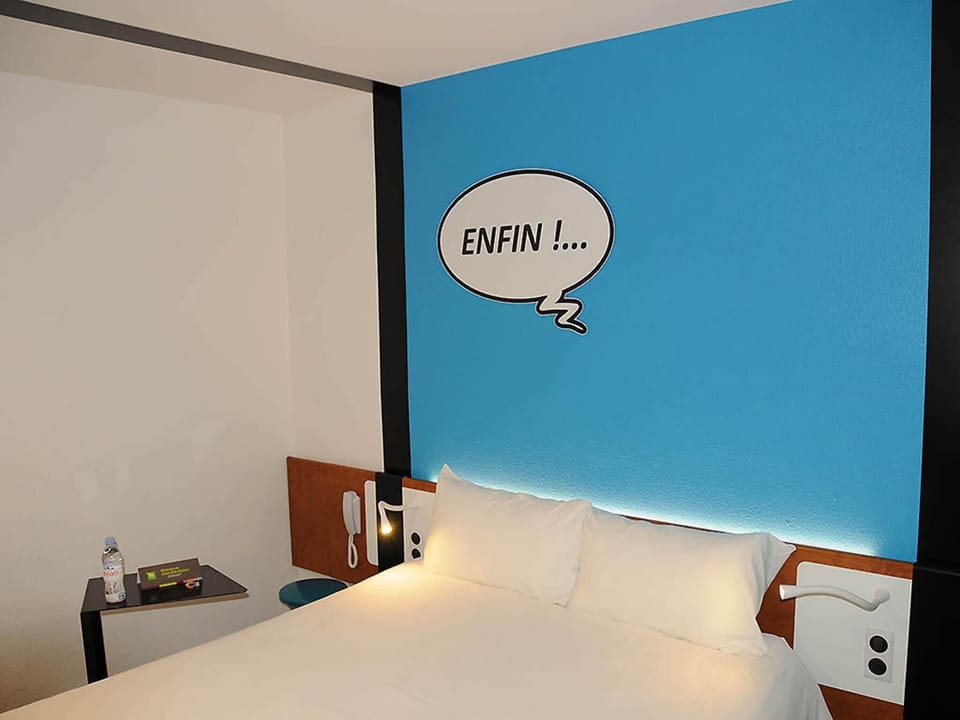 Premium bedding, blackout drapes, soundproofing, free WiFi