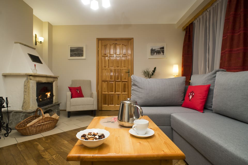 Apartment, 2 Bedrooms, Fireplace | Living area | Flat-screen TV