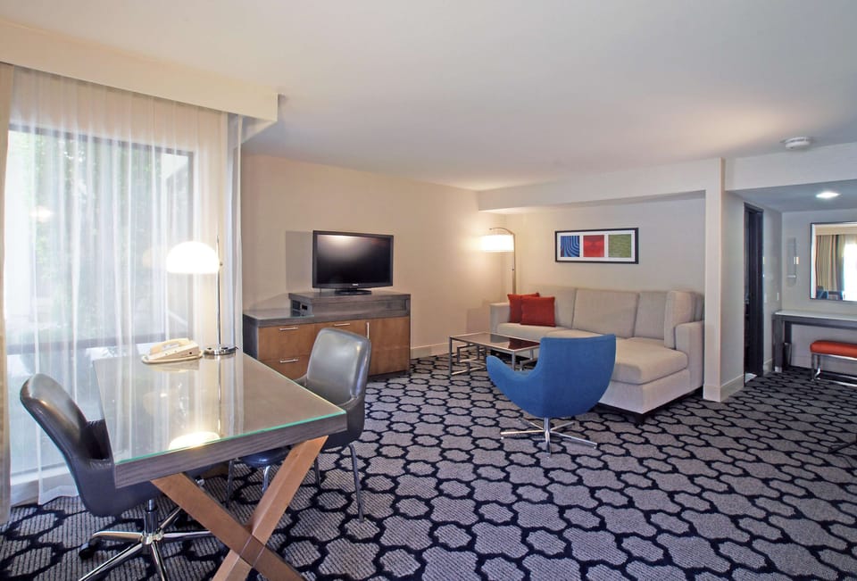 Premium bedding, down comforters, pillowtop beds, in-room safe