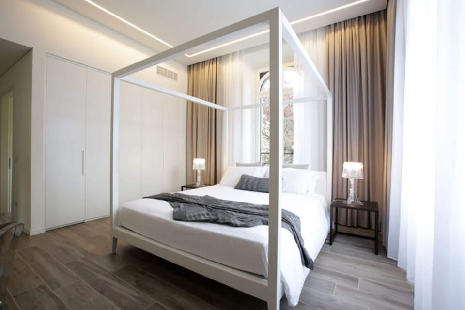 Deluxe Double Room, Garden View | Premium bedding, minibar, in-room safe, desk