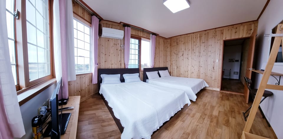 Family Double or Twin Room, 2 Queen Beds, Non Smoking, Partial Sea View | Soundproofing, free WiFi