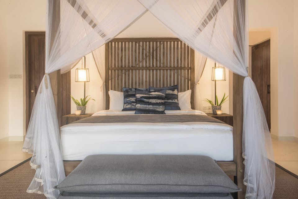Oceanview Suite | Minibar, in-room safe, individually furnished, desk