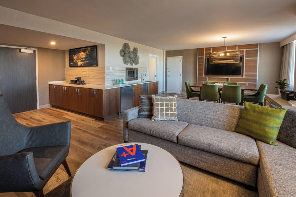 Room, 1 King Bed with Sofa bed | Living area | 52-inch Smart TV with satellite channels, TV, Netflix