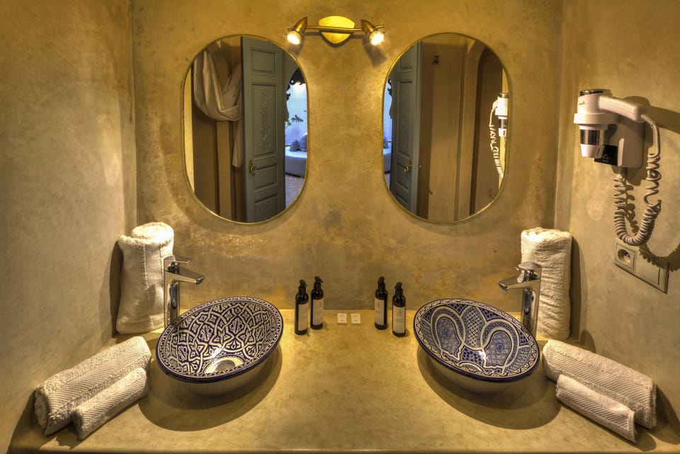 Suite, Shared Bathroom, Mezzanine | Bathroom | Towels, soap, shampoo, toilet paper