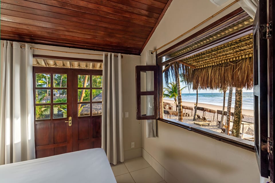 Premium Double Room Single Use, Beachfront | Minibar, desk, free WiFi, bed sheets