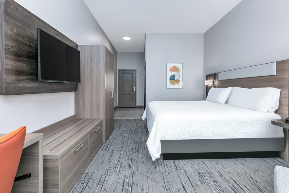 In-room safe, desk, iron/ironing board, cribs (free)