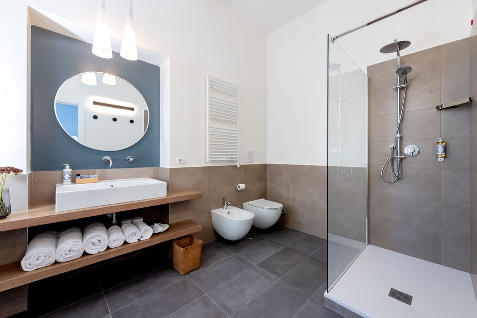 Panoramic Triple Room | Bathroom | Shower, free toiletries, hair dryer, slippers