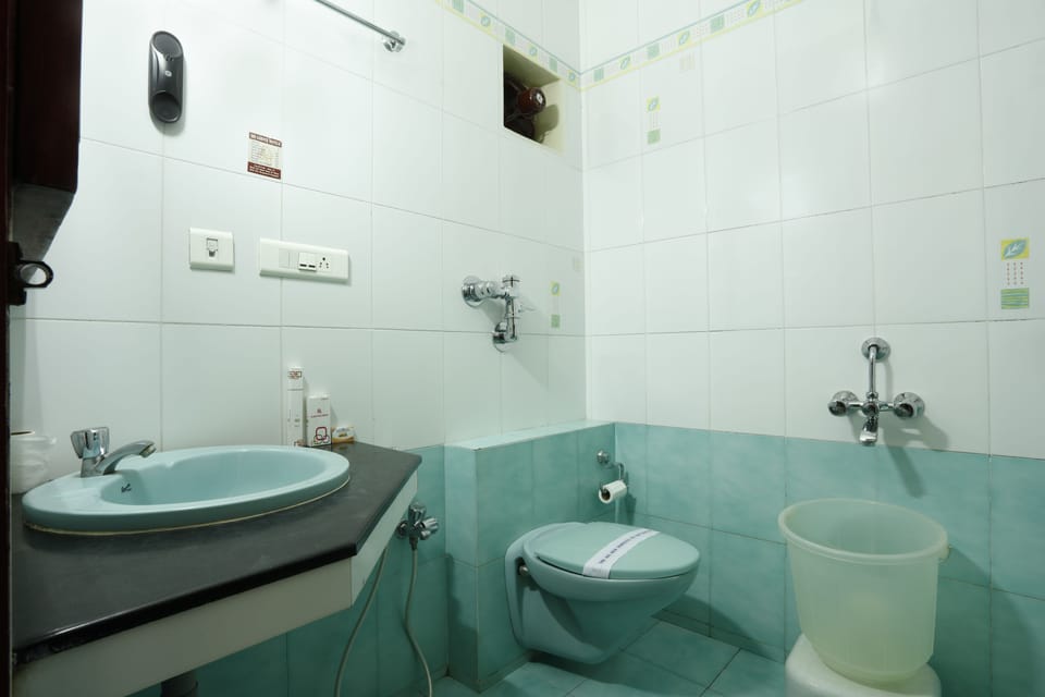 Shower, designer toiletries, bathrobes, towels