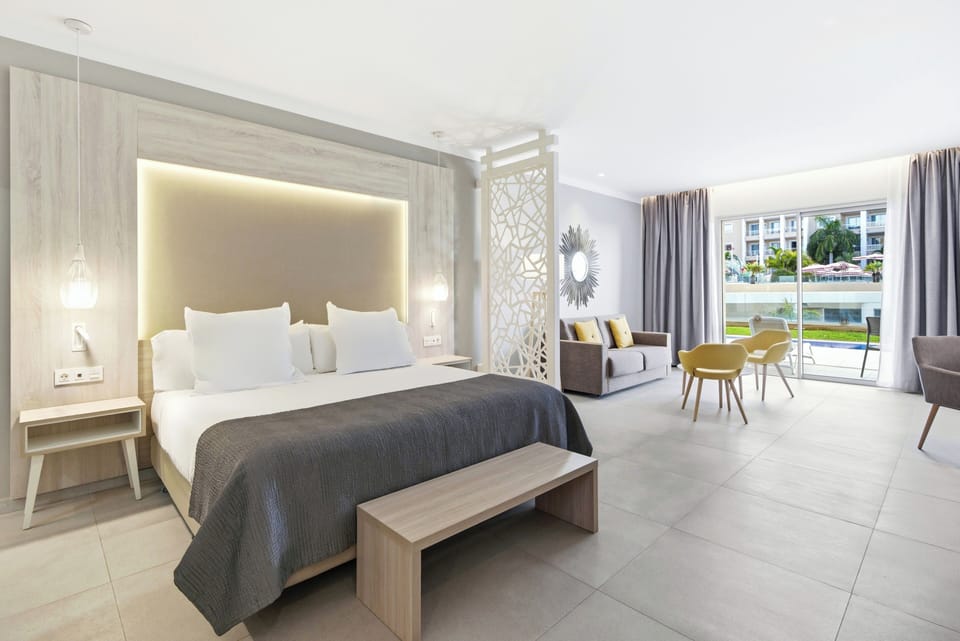 Premium bedding, down comforters, memory foam beds, minibar