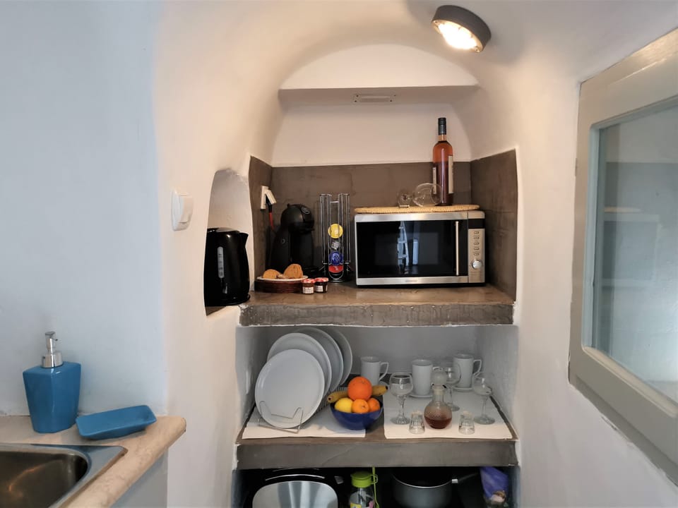 Full-size fridge, microwave, stovetop, espresso maker