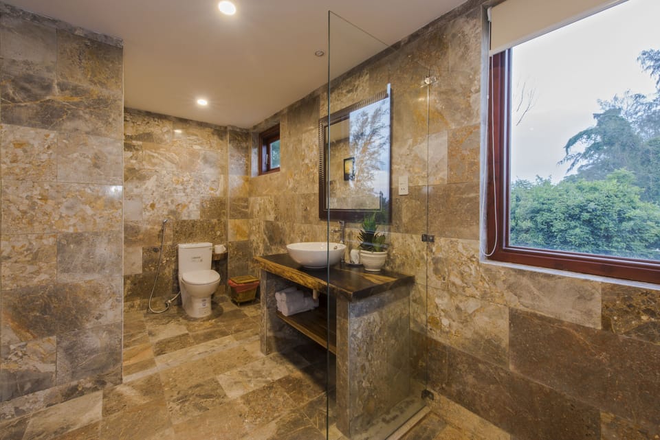 Shower, free toiletries, hair dryer, bathrobes