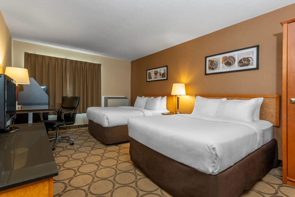 Premium bedding, pillowtop beds, desk, blackout drapes