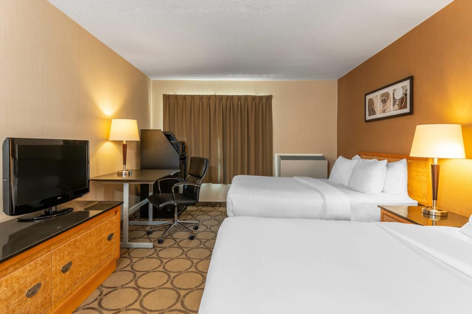 Premium bedding, pillowtop beds, desk, blackout drapes