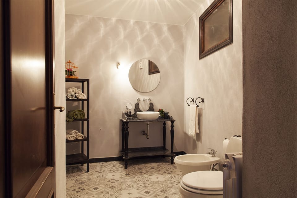 Triple Room, Mountain View | Bathroom | Free toiletries, hair dryer, bathrobes, towels