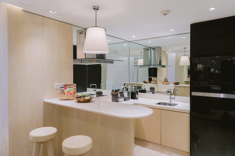 Family Apartment, 2 Bedrooms (Lagoon Pool Residence) | Private kitchenette | Coffee/tea maker, dining tables