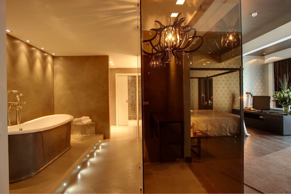 Junior Suite, 1 King Bed (Penthouse;with Sofabed) | Hypo-allergenic bedding available, down comforters, minibar