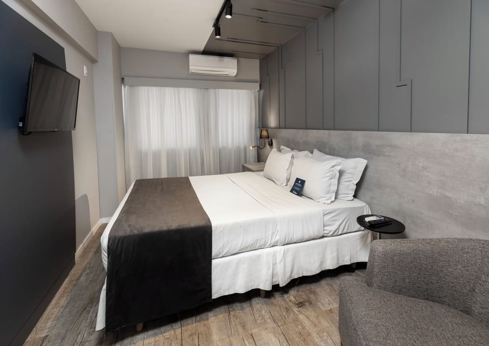 Family Room, 2 Bedrooms | Minibar, in-room safe, desk, blackout drapes