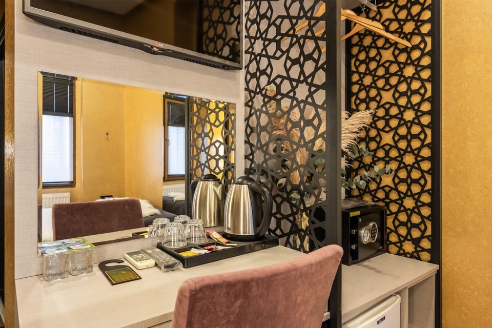Economy Double Room | Minibar, in-room safe, desk, soundproofing