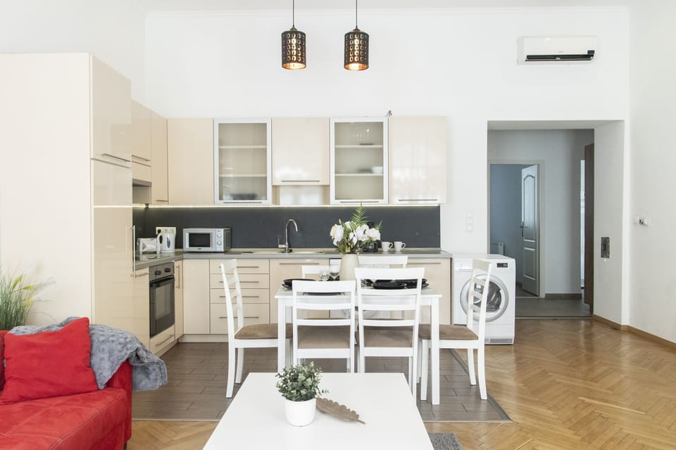 Deluxe Apartment | Living area | TV