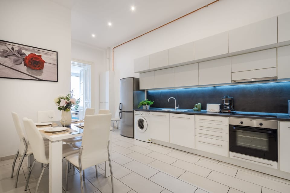Executive Apartment | Private kitchen | Fridge, highchair, dining tables