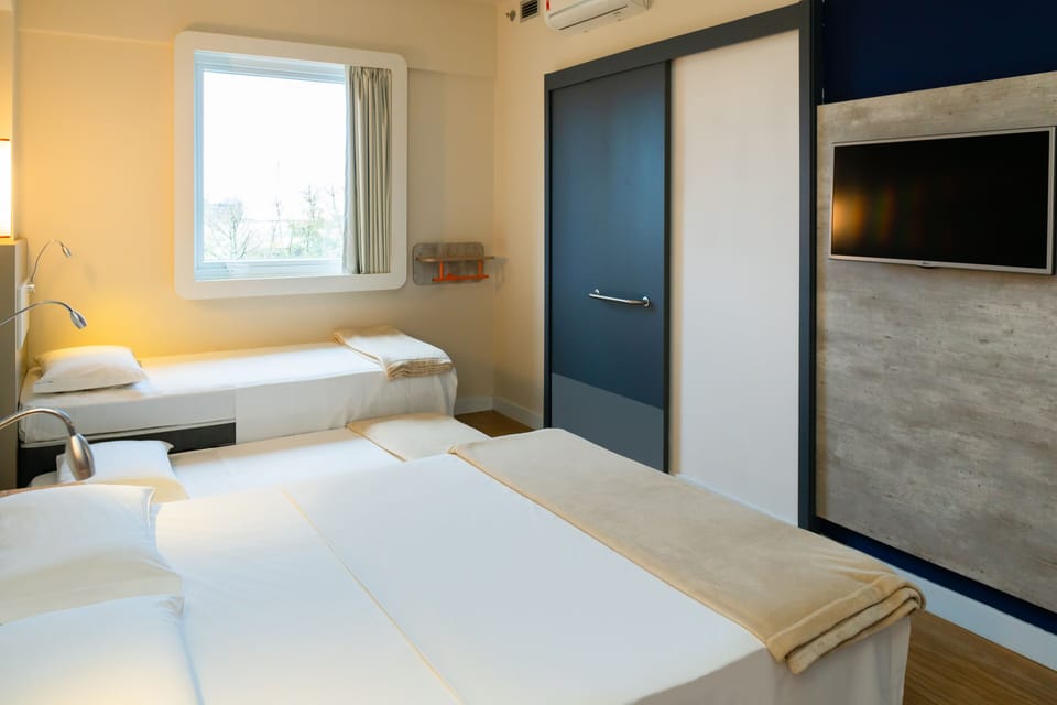 Standard Apartment, Multiple Beds | Blackout drapes, soundproofing, free WiFi, bed sheets