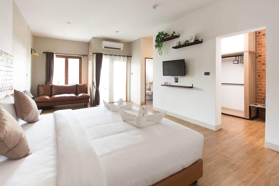 Suite Garden View with Bunk bed (Family Garden View) | In-room safe, laptop workspace, free WiFi, bed sheets