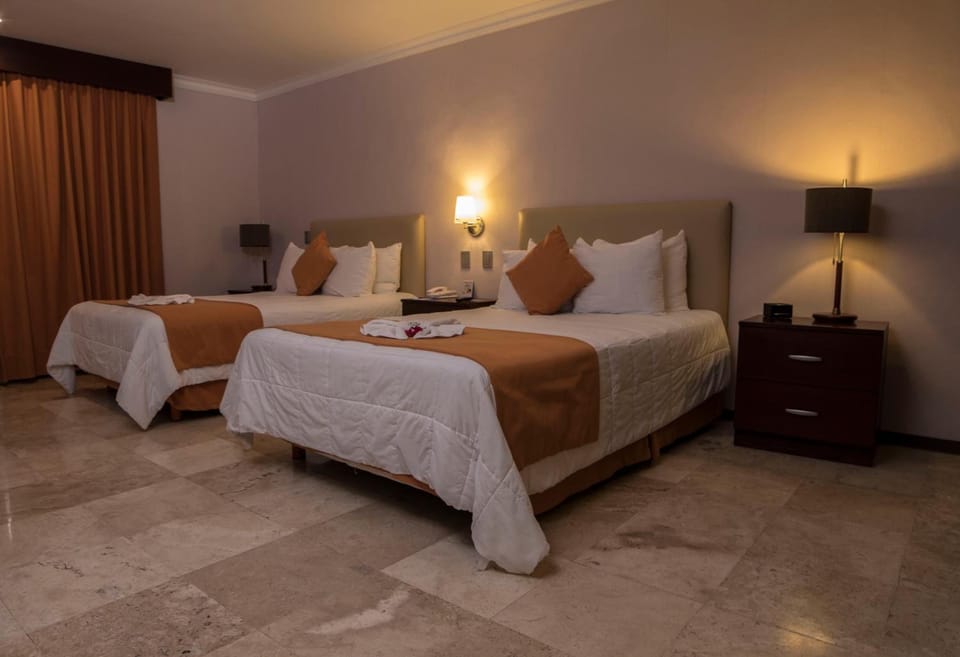 Premium bedding, down comforters, in-room safe, desk