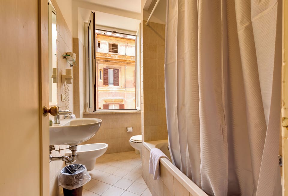 Shower, rainfall showerhead, eco-friendly toiletries, hair dryer