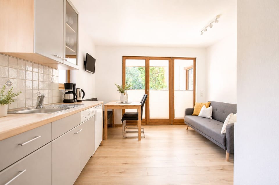 Family Apartment, 2 Bedrooms, Mountain View, Slope side | Private kitchen | Coffee/tea maker, fridge, stovetop, dishwasher