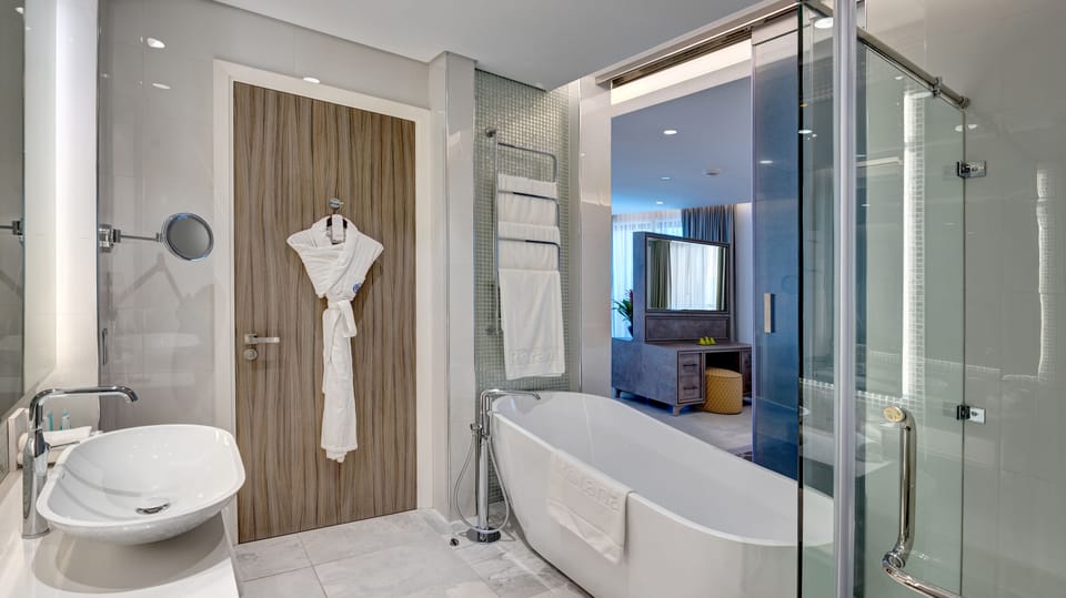 Eco-friendly toiletries, hair dryer, bathrobes, slippers