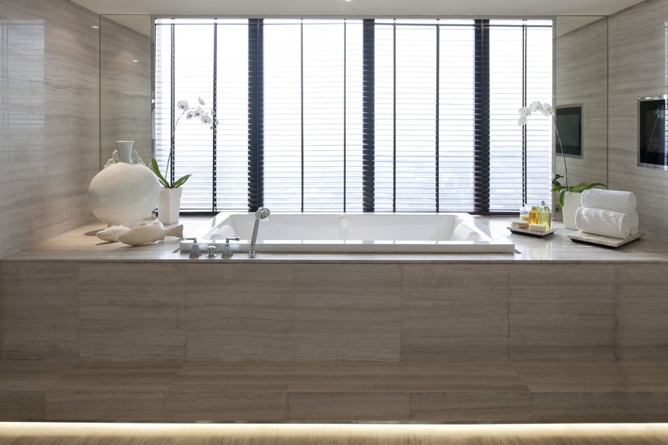 Mandarin, Suite, 1 King Bed | Bathroom | Separate tub and shower, deep soaking tub, rainfall showerhead
