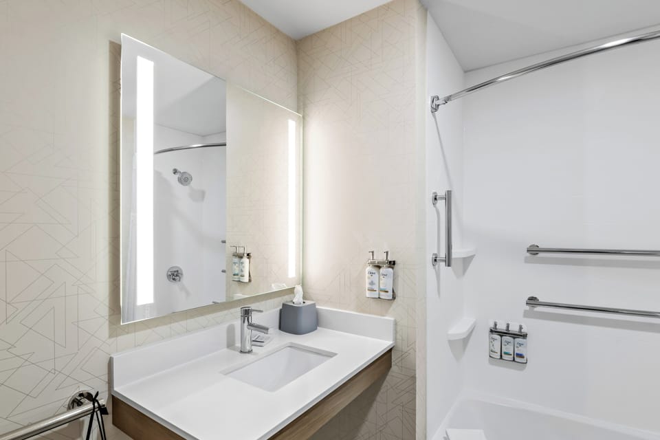 Standard Room, 2 Queen Beds | Bathroom | Combined shower/tub, free toiletries, hair dryer, towels