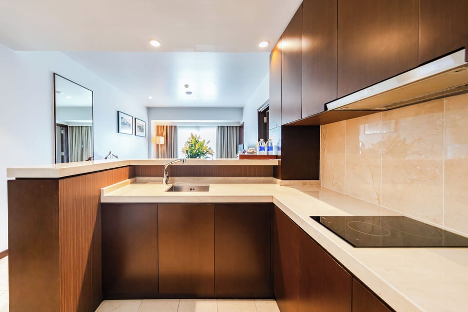 Grand Pearl Suite | Private kitchen | Fridge, electric kettle, paper towels
