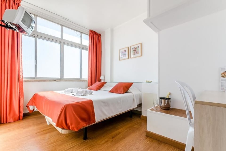Double or Twin Room, Shared Bathroom | In-room safe, desk, blackout drapes, iron/ironing board