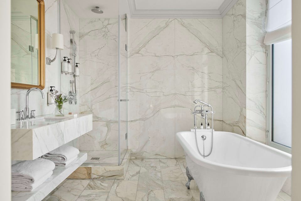 Suite (Pissarro) | Bathroom | Rainfall showerhead, designer toiletries, hair dryer, bathrobes