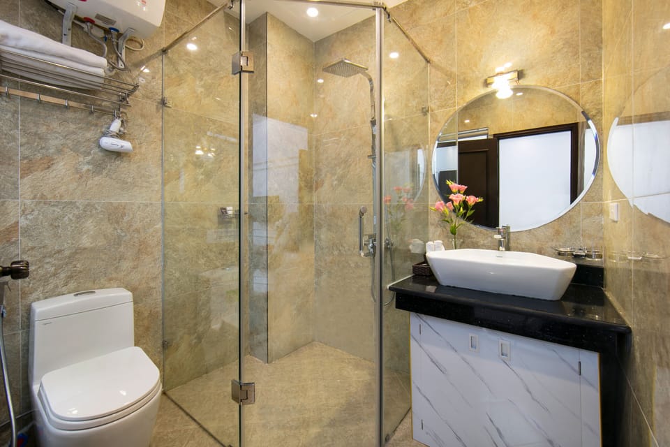 Shower, free toiletries, hair dryer, bathrobes