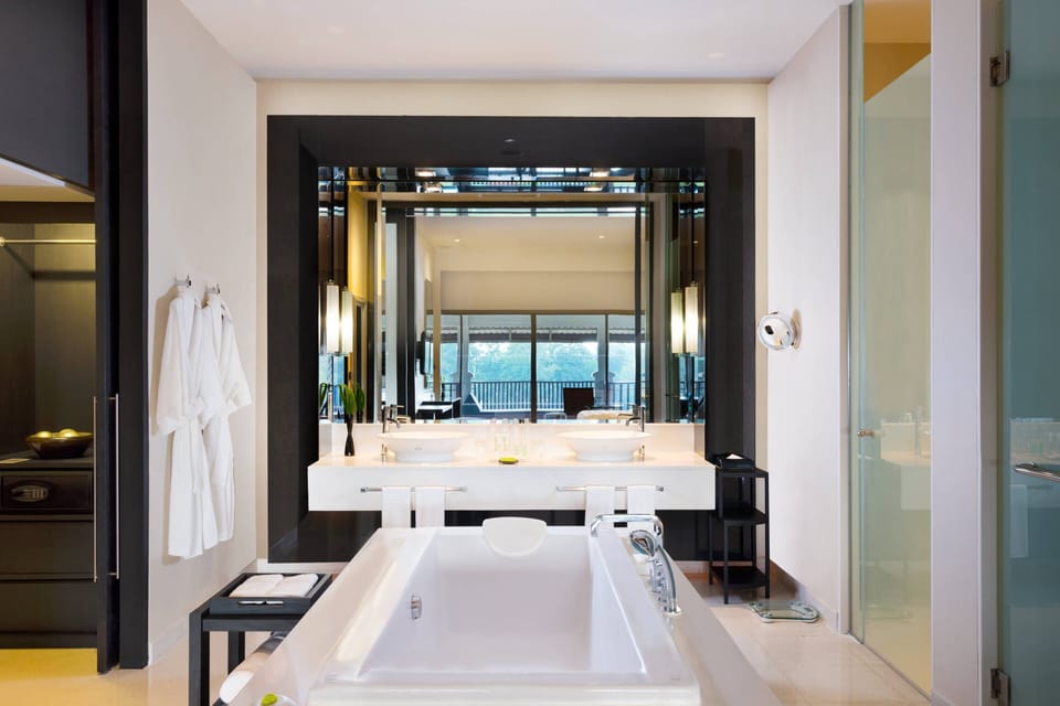 Suite, 1 Bedroom, Balcony, Pool View (Balcony) | Bathroom | Separate tub and shower, deep soaking tub, rainfall showerhead