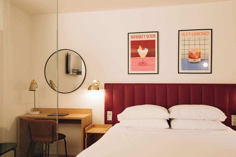 Down comforters, memory foam beds, in-room safe, desk