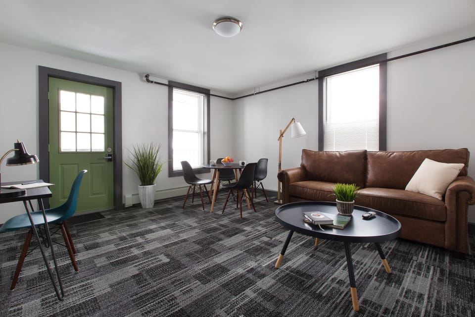 Suite, 2 Bedrooms | Living area | 50-inch flat-screen TV with digital channels, TV