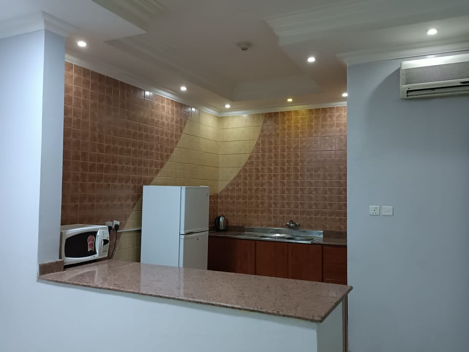 Mini-fridge, microwave, electric kettle, eco-friendly cleaning products