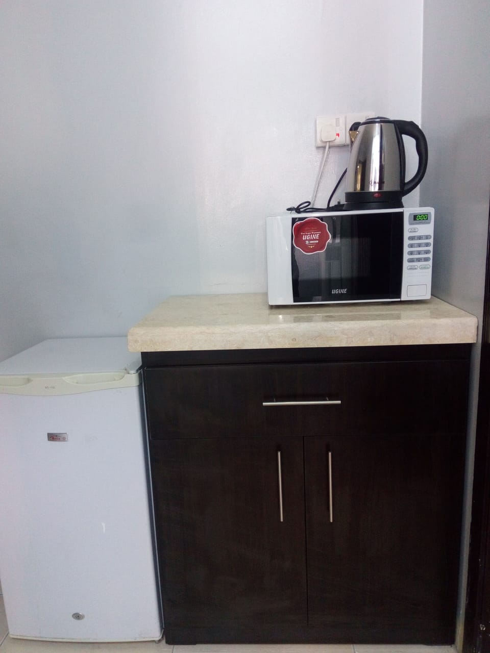Mini-fridge, microwave, electric kettle, eco-friendly cleaning products