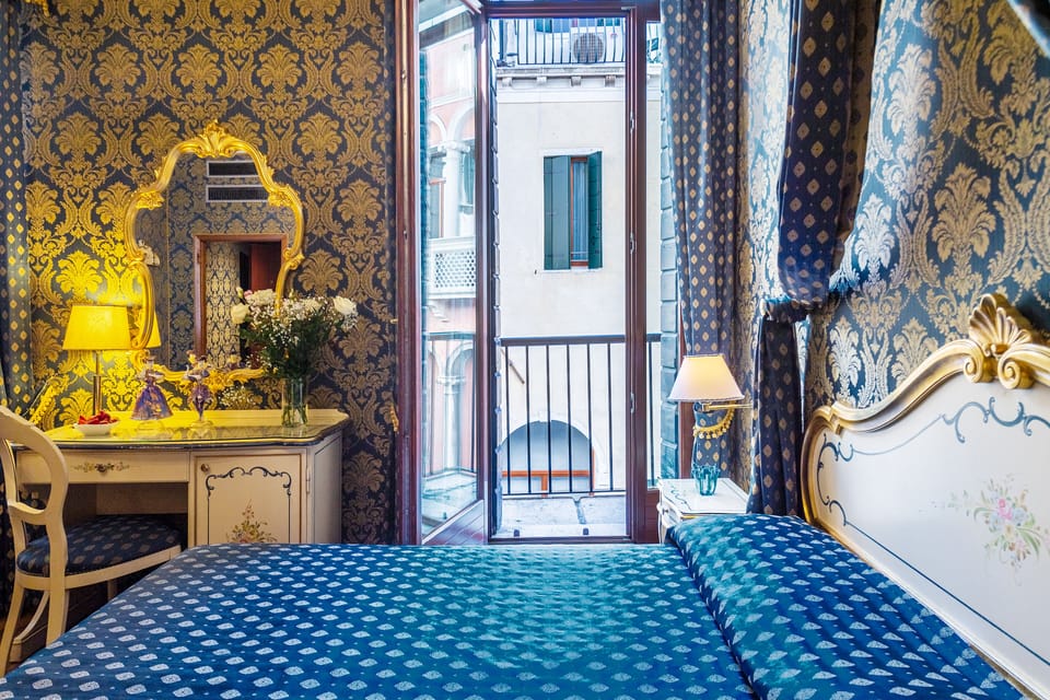 Deluxe Double Room, Canal View and Balcony (1st and 2nd floor) | 1 bedroom, Select Comfort beds, minibar, in-room safe